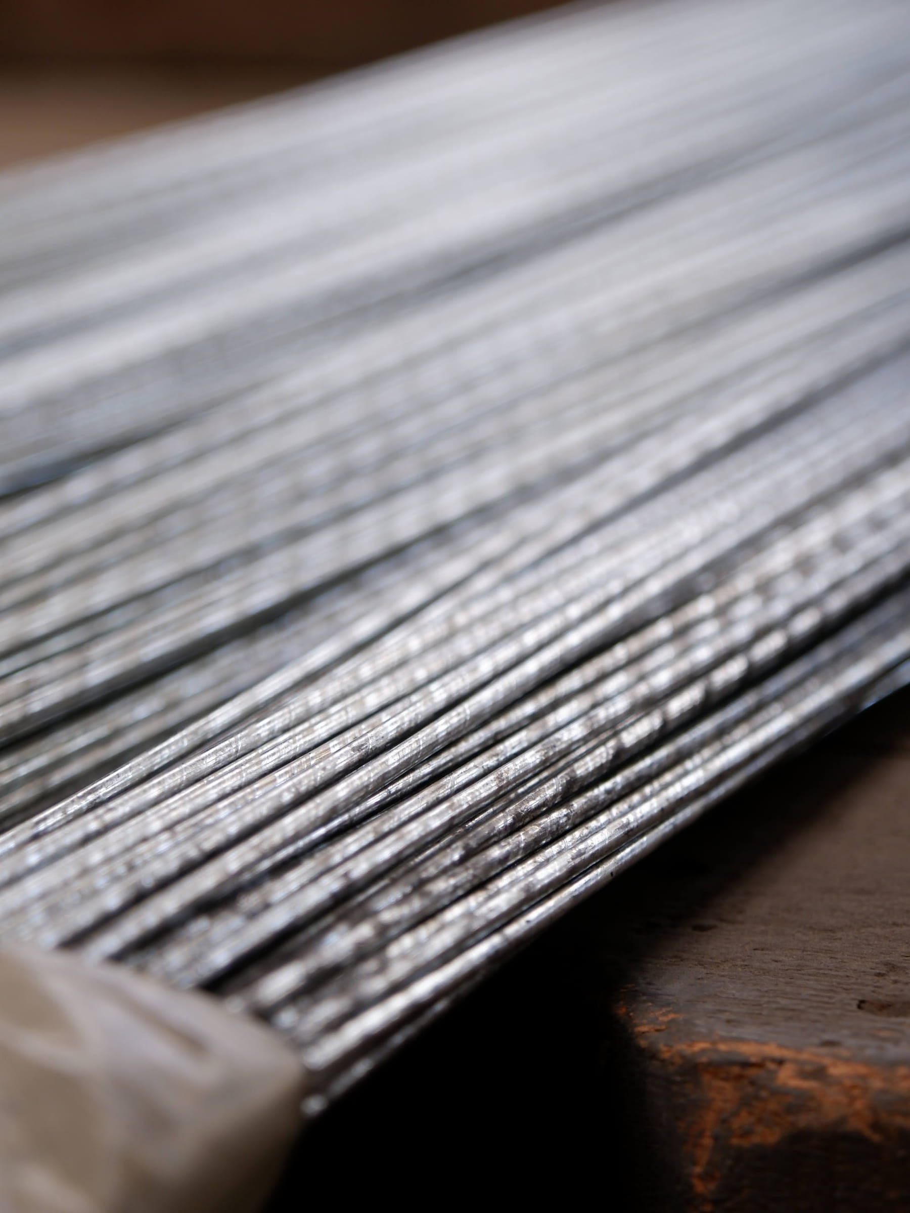 Close-up of round wire on a work surface